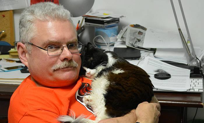 Choco the Cat cuddles with Paul